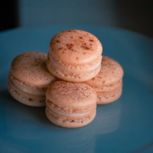 Cool Background of Warm Cinnamon french macrons